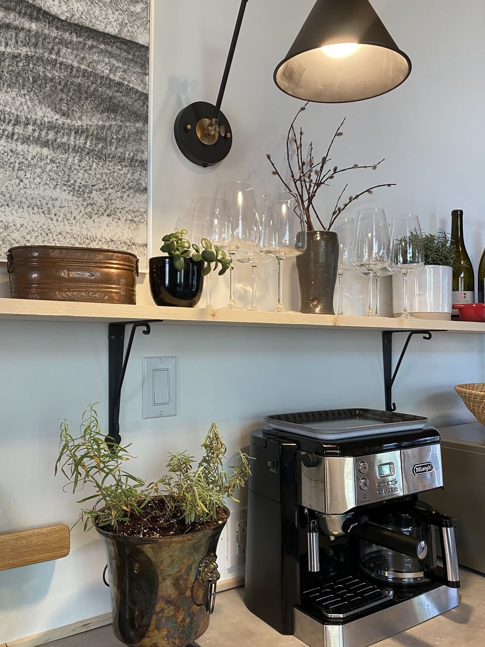 Top floor kitchen with coffee/espresso machine. 