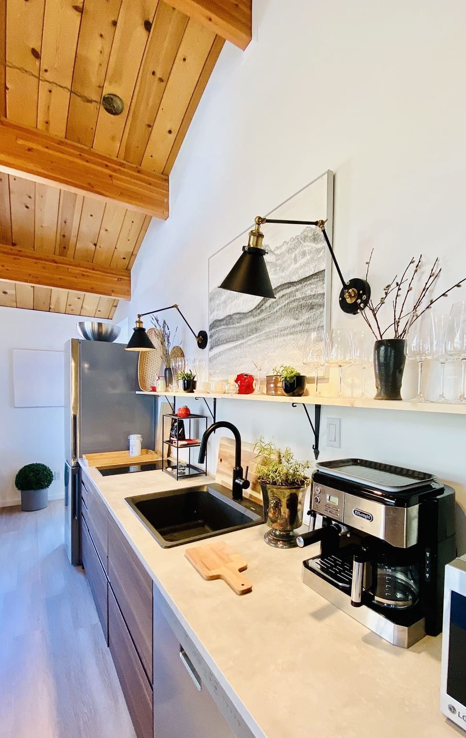 Top floor kitchen with fridge, d/w, microwave, 2 burner cooktop - no oven. 