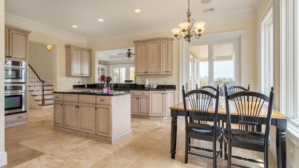 This spacious, light-filled kitchen combines classic style with modern convenience.