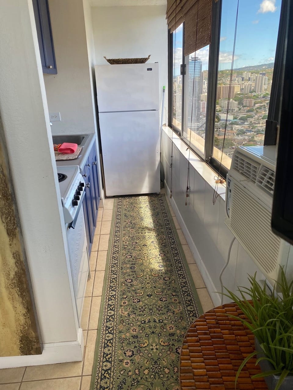 Full kitchen with good window light.