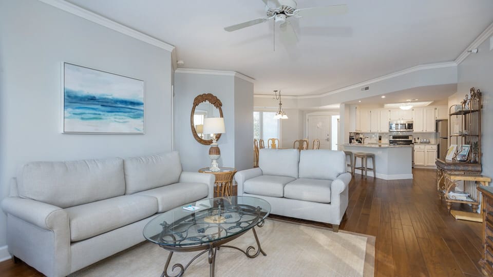 The layout flows easily into the dining area, creating an inviting setting for relaxing, gathering, and enjoying the natural surroundings.