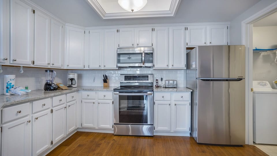 The kitchen is bright, open, and thoughtfully designed for easy vacation living.