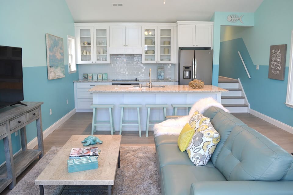 Very open floor plan with breakfast bar, great seating and family environment!