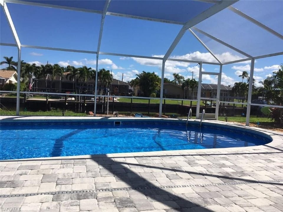 Screened-in pool, with fabulous bug free view!

