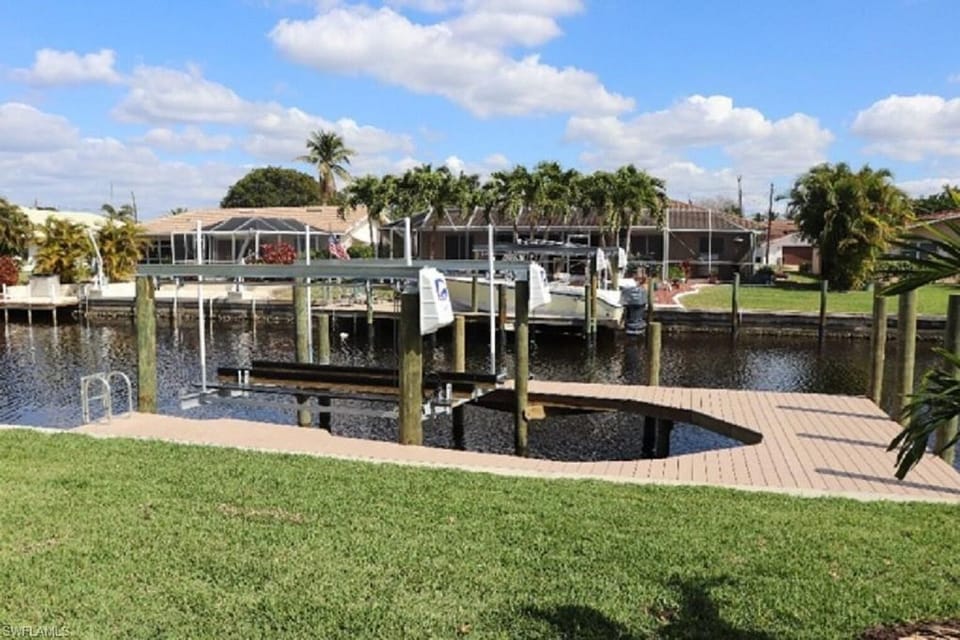 Boat lift and dock included!