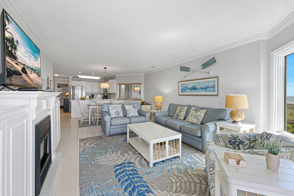 With plenty of natural light and a relaxed beach-inspired style, this room serves as a welcoming centerpiece of the villa.