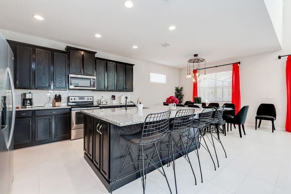 View 3 of gorgeous dining room table seating 10