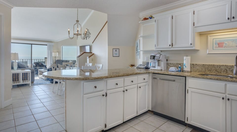 The open layout makes this the perfect gathering space for unwinding after a day on the sand.