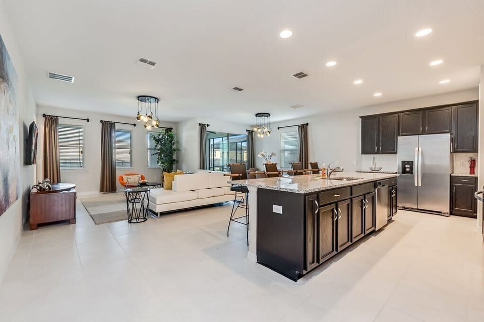 Wide angle view of amazing kitchen and living area