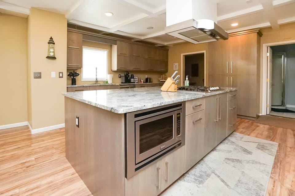 Built in 1200-watt microwave.