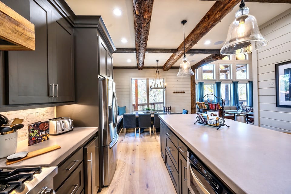 The kitchen seamlessly transitions into the formal dining area.