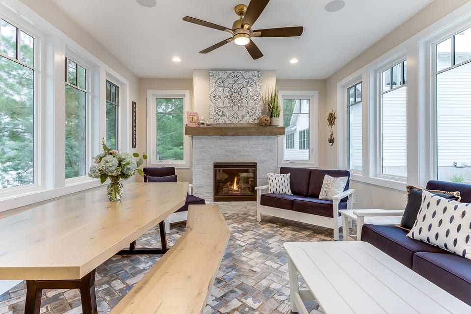 Navy 4 Season Screened Porch with heated tile floor, gas fireplace