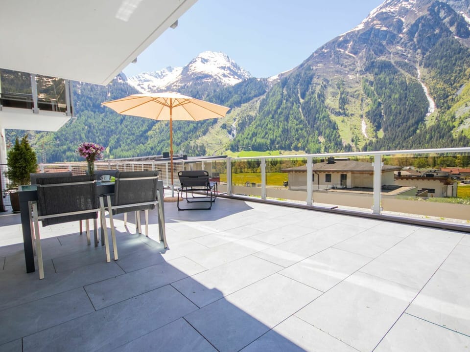 Sky, Property, Mountain, Building, Plant, Shade, Architecture, Leisure, Outdoor Furniture, House