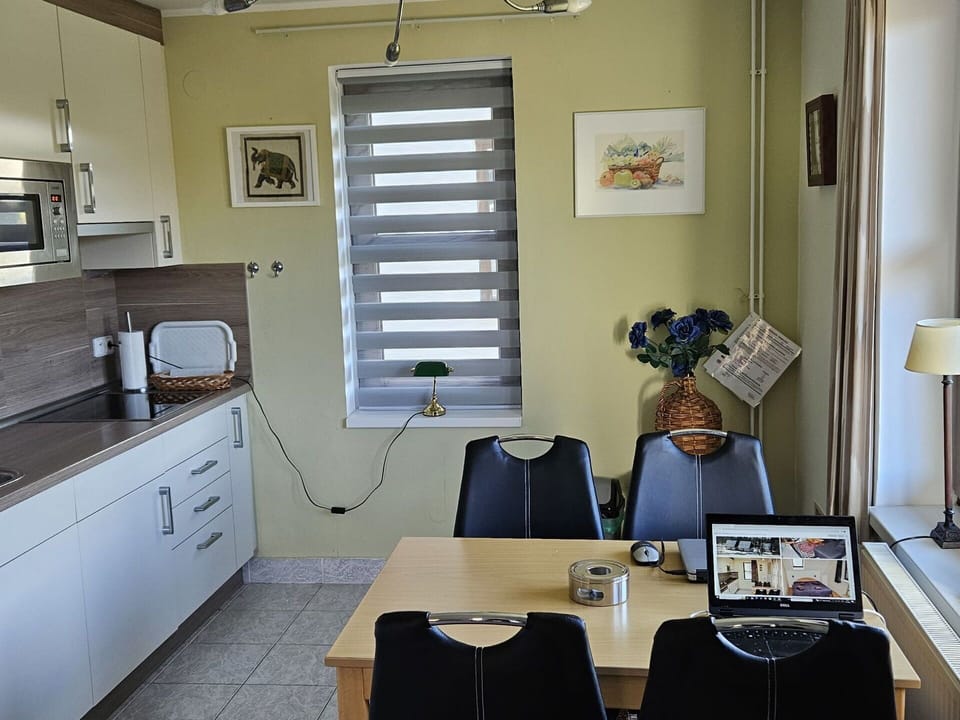Table, Property, Furniture, Cabinetry, Building, Chair, Interior Design, Window, Floor, Flooring