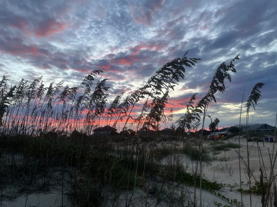 Beautiful St. Augustine Beach sunset steps from LunaSea Beach House.
