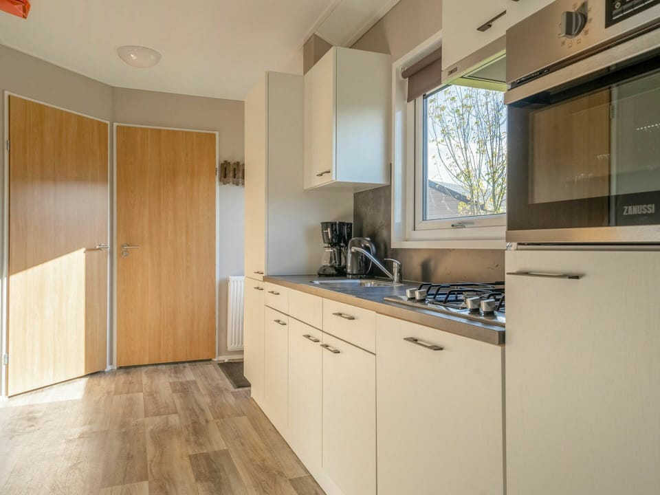 Room, Cabinetry, Property, Countertop, Furniture, Kitchen, Interior Design, Floor, Building, Cupboard