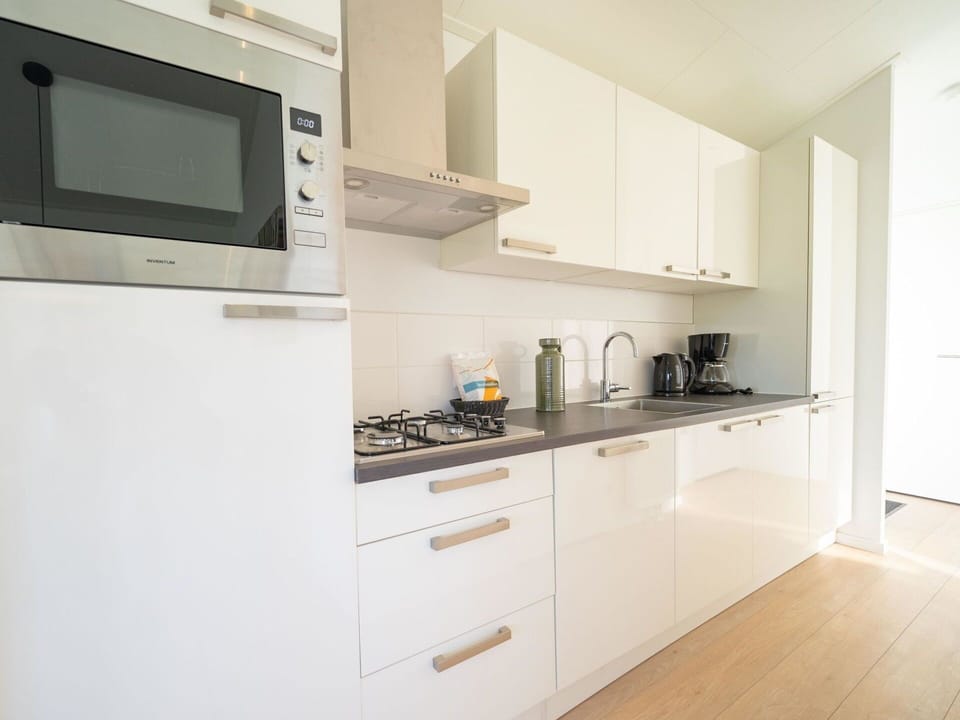 Cabinetry, Countertop, Kitchen Appliance, Home Appliance, Building, Kitchen Stove, Wood, Kitchen, Interior Design, Major Appliance