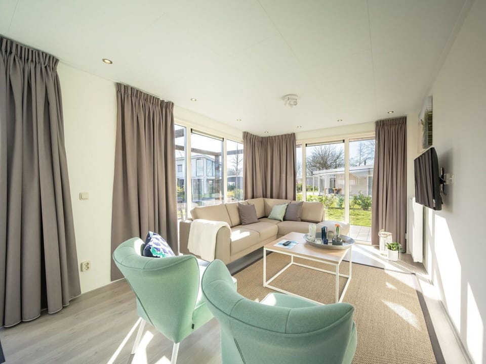 Property, Furniture, Couch, Building, Window, Curtain, Plant, Wood, Table, Chair