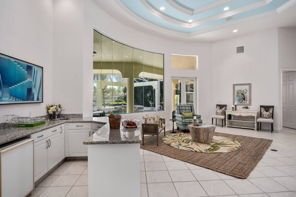 Grab a drink from the wet bar just off the entry and make yourself comfortable.