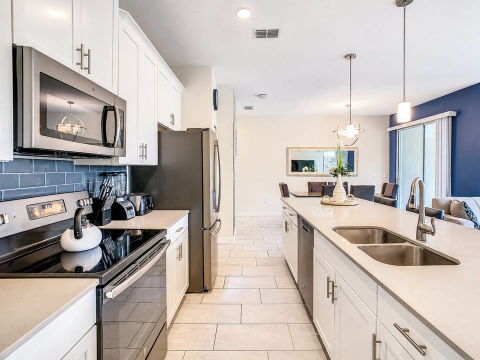 Modern kitchen with stainless appliances and spacious island