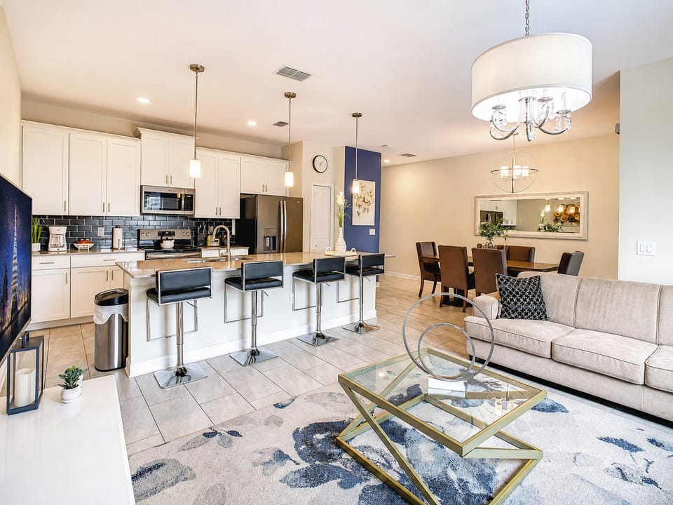 Open-Concept Living Area with Modern Kitchen and Breakfast Bar