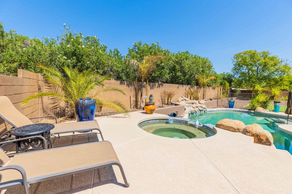 Sunbathe in our chaise loungers by the pool