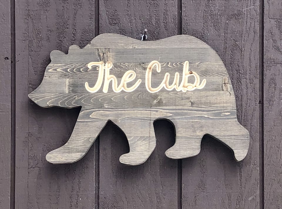 Sign on the Guest Cabin, The "Cub Cabin"