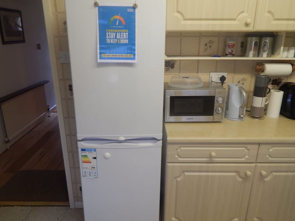 Fridge / Freezer, Microwave oven, Coffee maker (with pods)