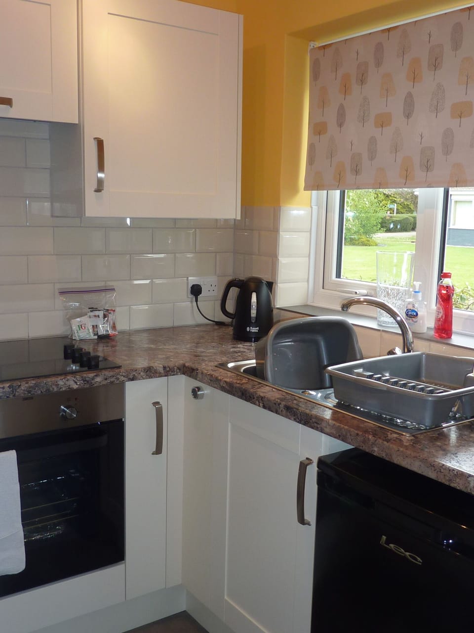 Kitchen area - all crockery, utensils and glasses provided for your stay.
