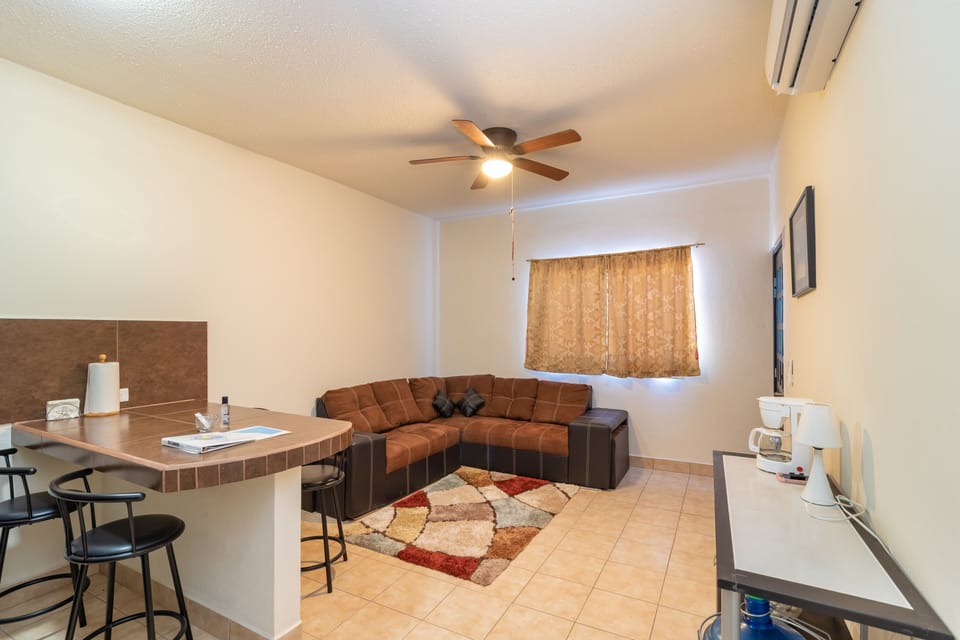 Livingroom has sofa-loveseat, fans, a/c, WiFi access