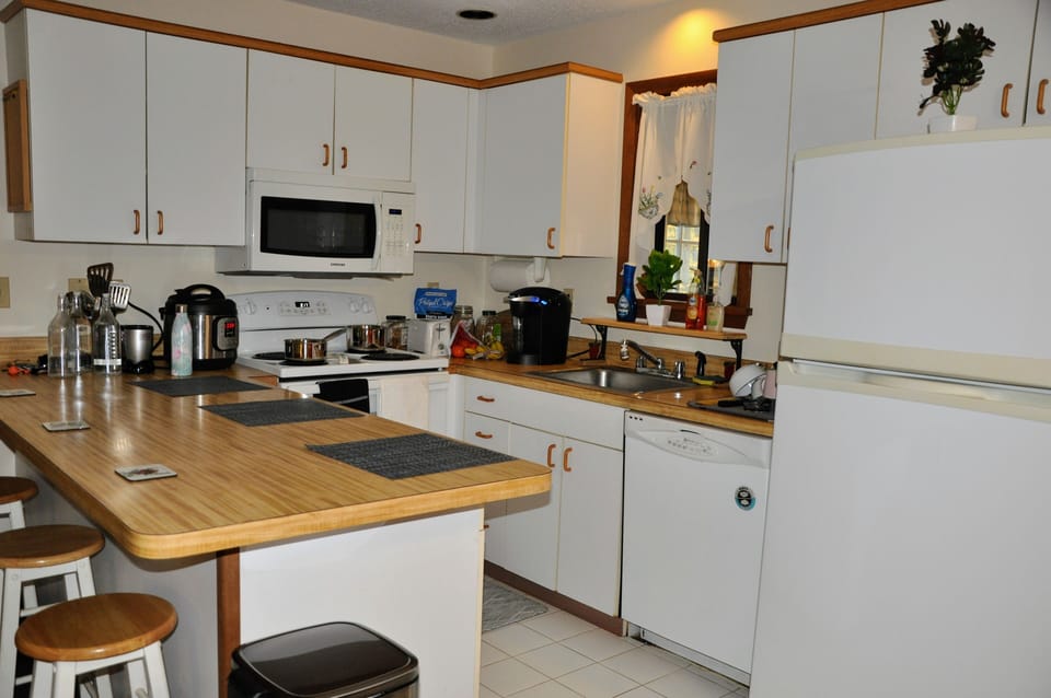 Fully equipped kitchen with coffee bar, instant pot, all pots and pans