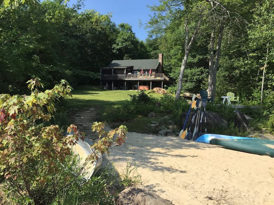 Large yard leading from house to the beach