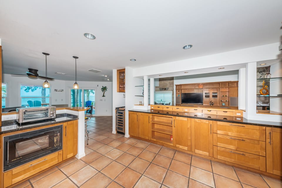 Kitchen w access to living rm and family rm-wine chiller-truly a family vacation