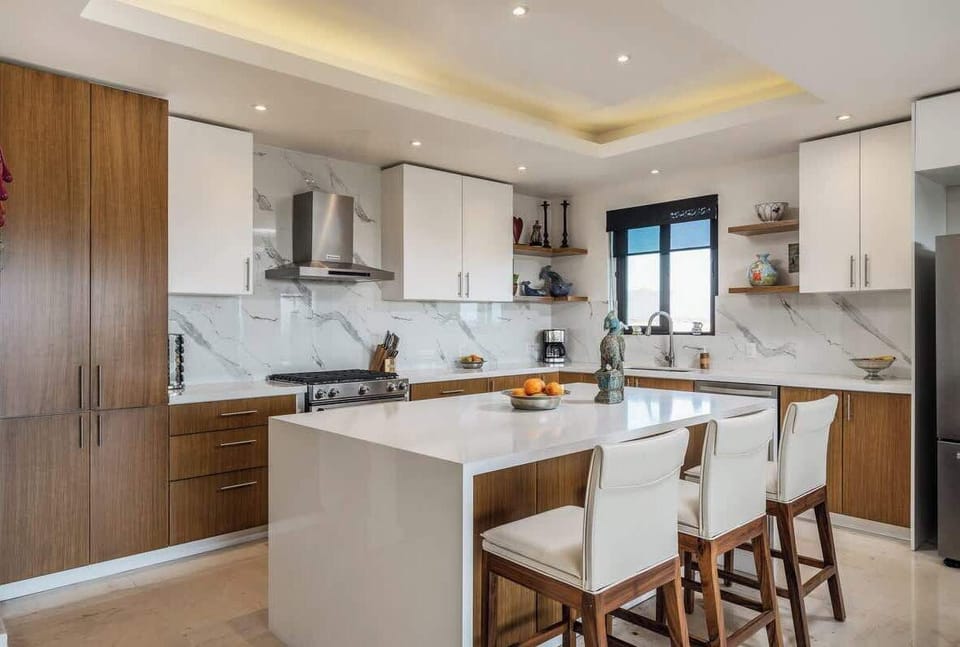 Fully equipped beach house kitchen with modern appliances
