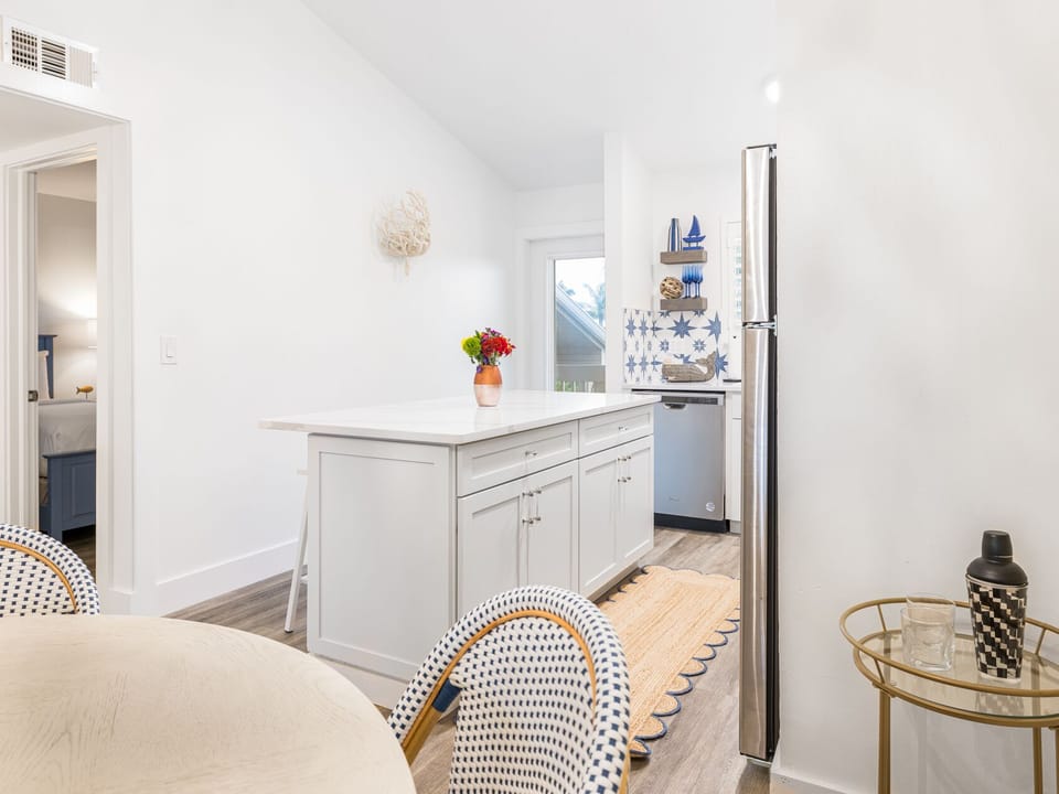 Pour a drink and chat as the kitchen opens to dining