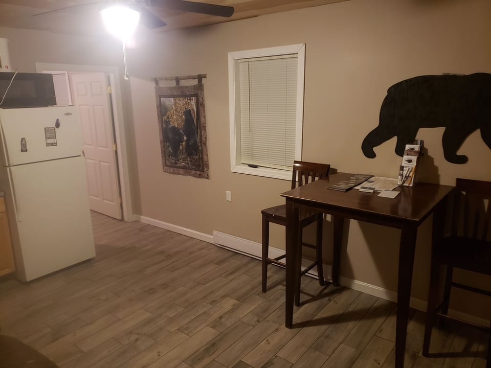 Table area looking to Bedroom door