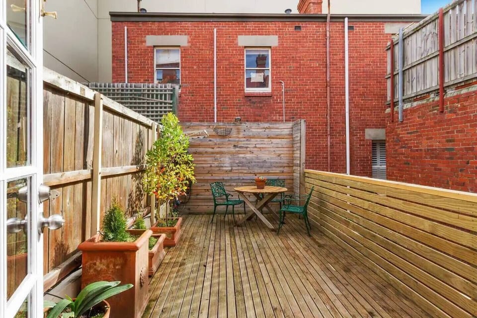 Enjoy your morning coffee or meals outdoors on the furnished deck adjacent to the kitchen.