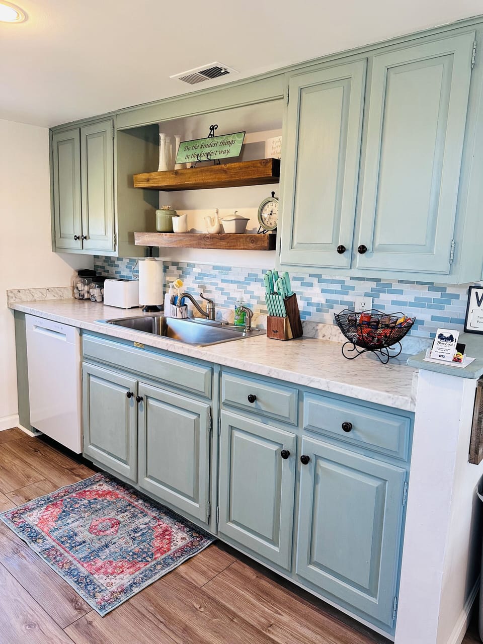 Full galley kitchen equipped with everything needed to cook meals in the cottage