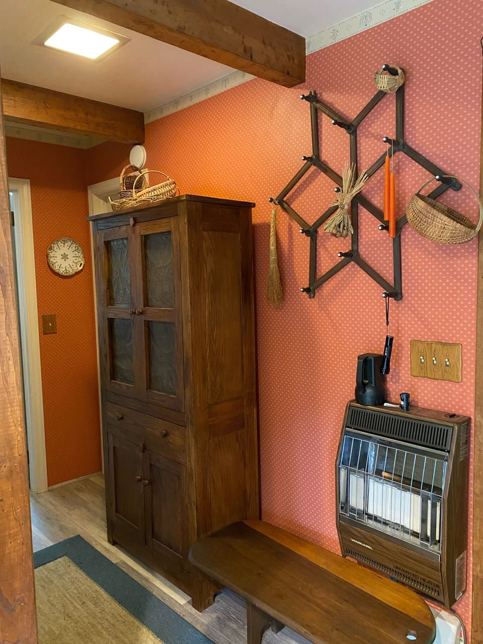 Antique pie safe for extra pots and kitchen pantry storage 