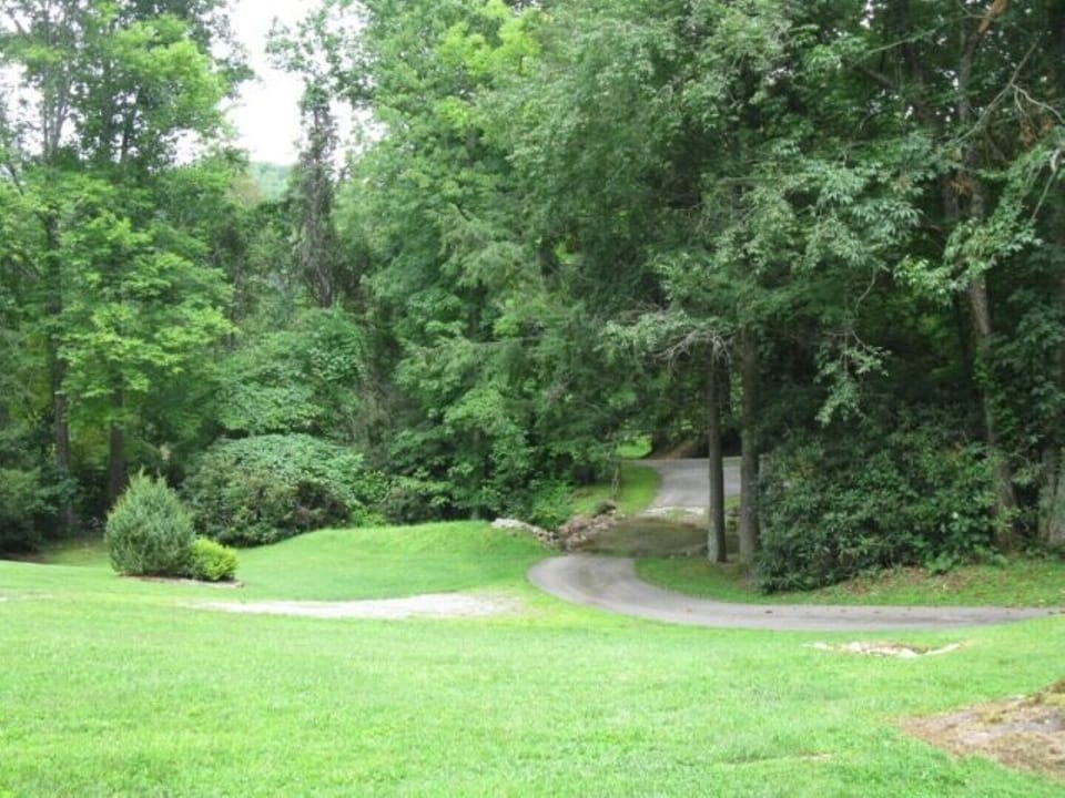 Beautifully maintained yard. Fun to walk or drive across creek ford! 