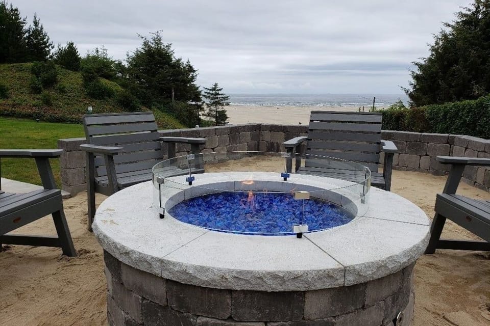 Unwind by the fire as waves and breezes surround you.