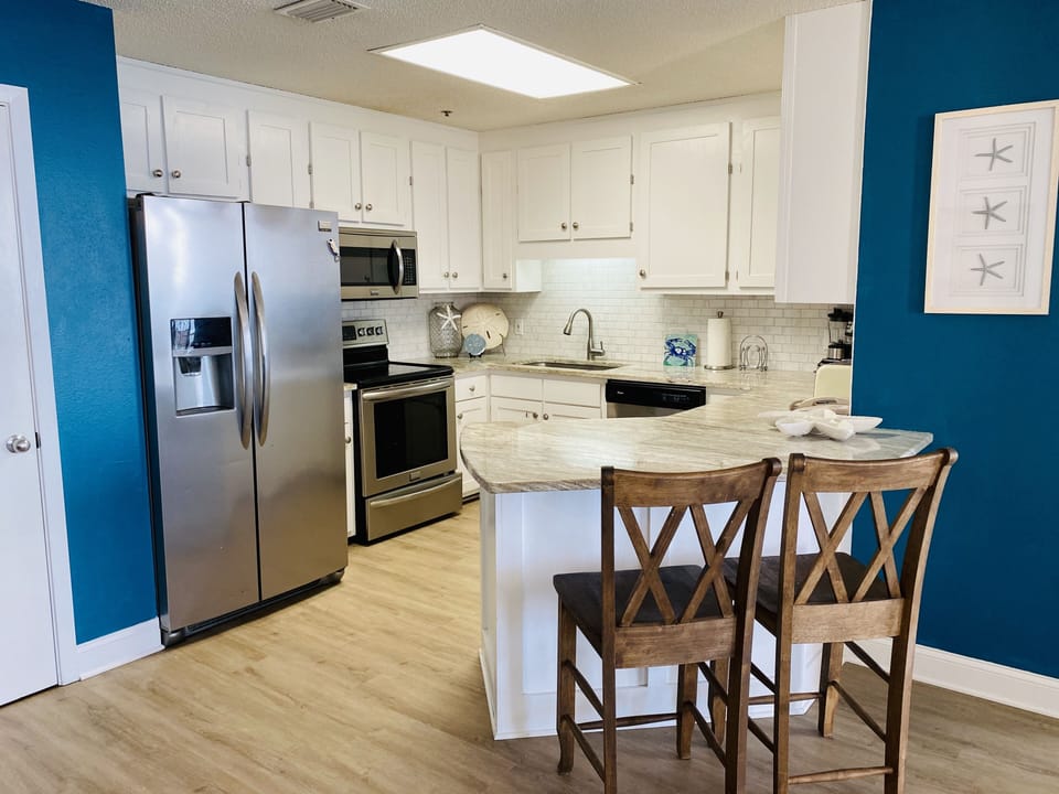 Kitchen bar has seating for two