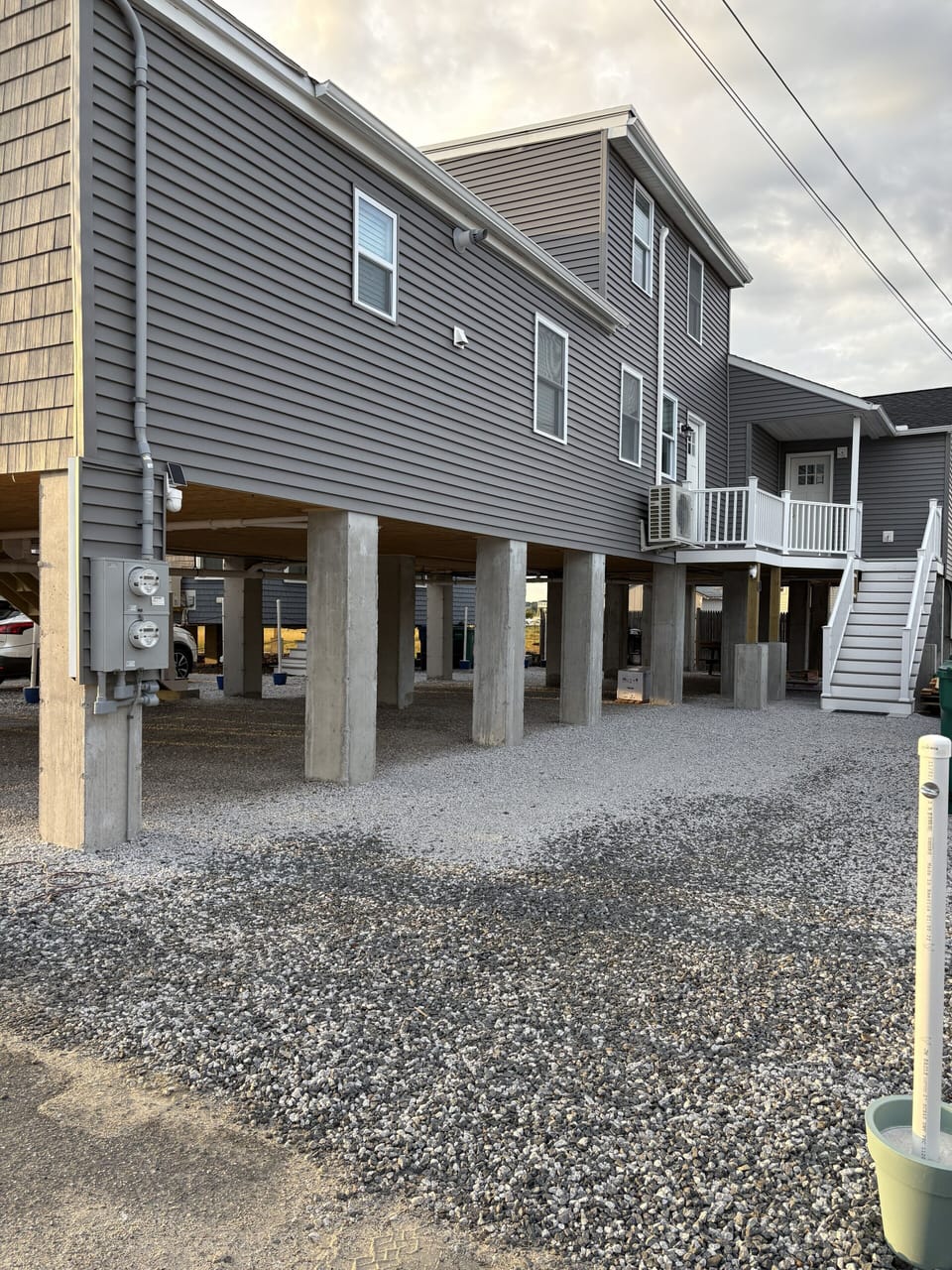 driveway, exterior stairs to units 2 and 3