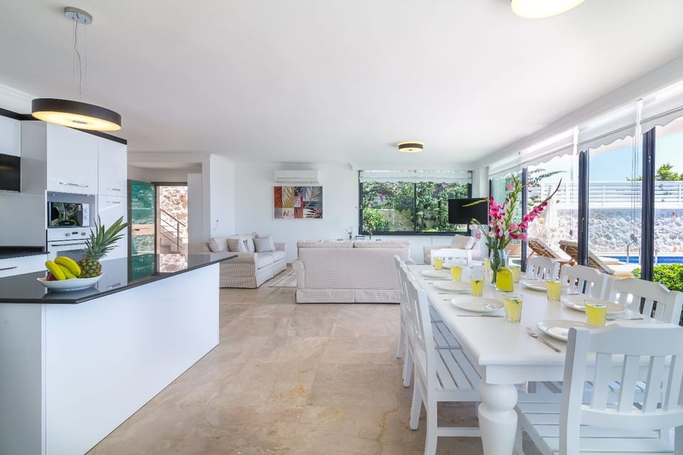 Open plan fully fitted kitchen with an island unit