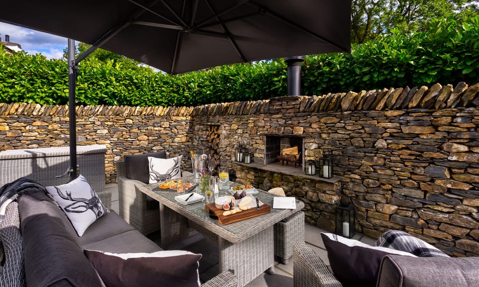 Private outside area with built in Log Burner with Orchard & Garden Views.