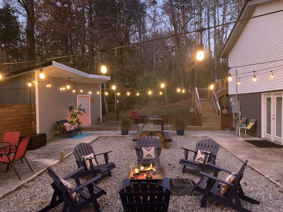 Shared outdoor courtyard with firepit and charcoal grill