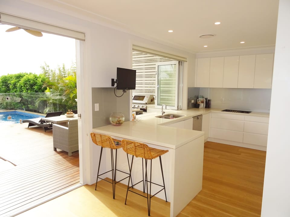 Open plan kitchen with bi-folds