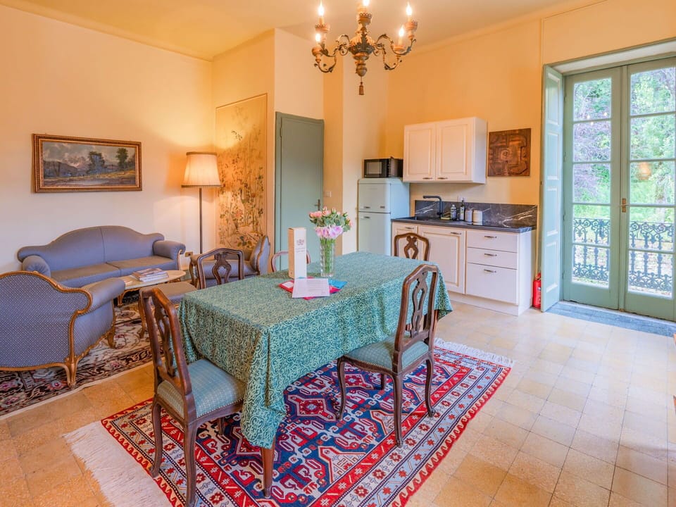 Property, Picture Frame, Furniture, Table, Azure, Interior Design, Decoration, Lighting, Wood, Flooring