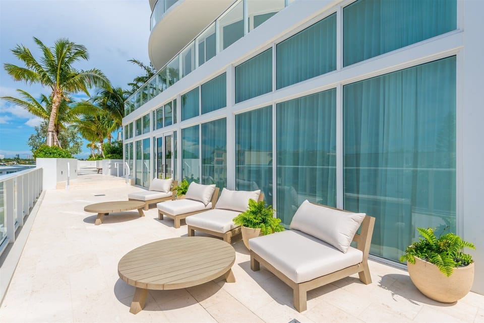 Outdoor terrace offers cushioned sun loungers