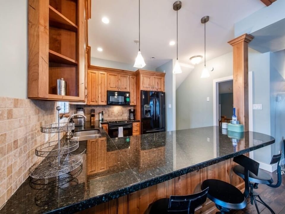 Large well stocked kitchen, with dining area adjacent.